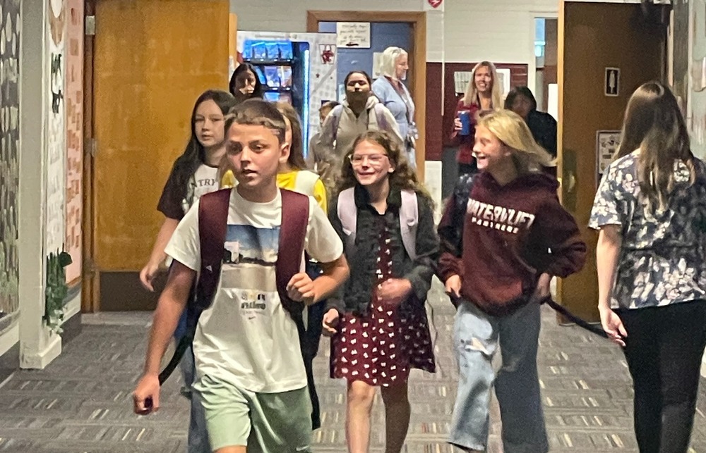 students walking inthe school hall