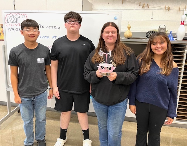 Students  with their kinetic sculpture