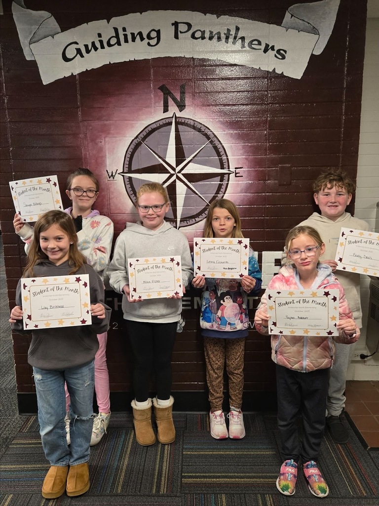 Students holding certificates