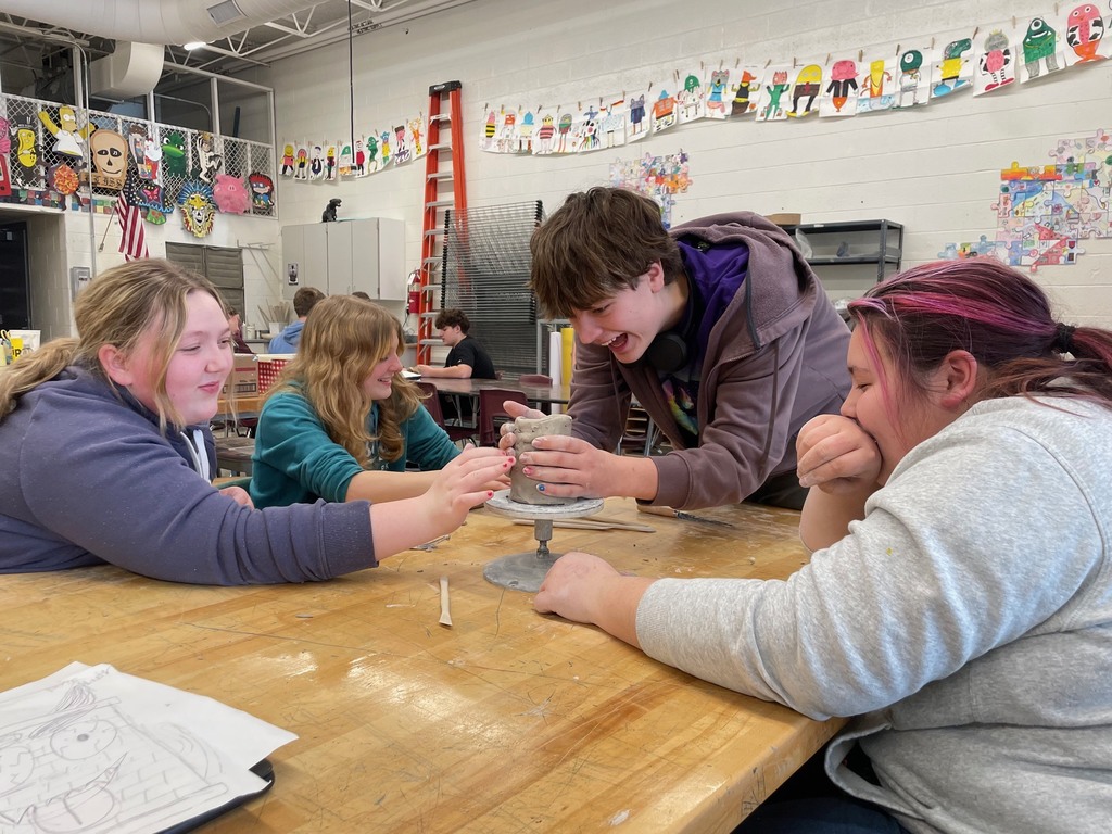 students building their clay coil project