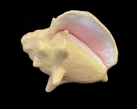 photo of a sea shell made of clay