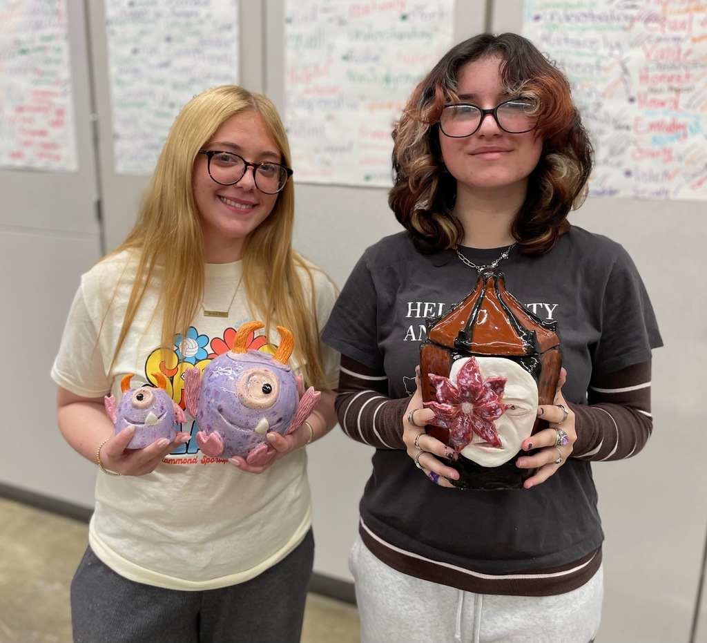 girls holding monster projects