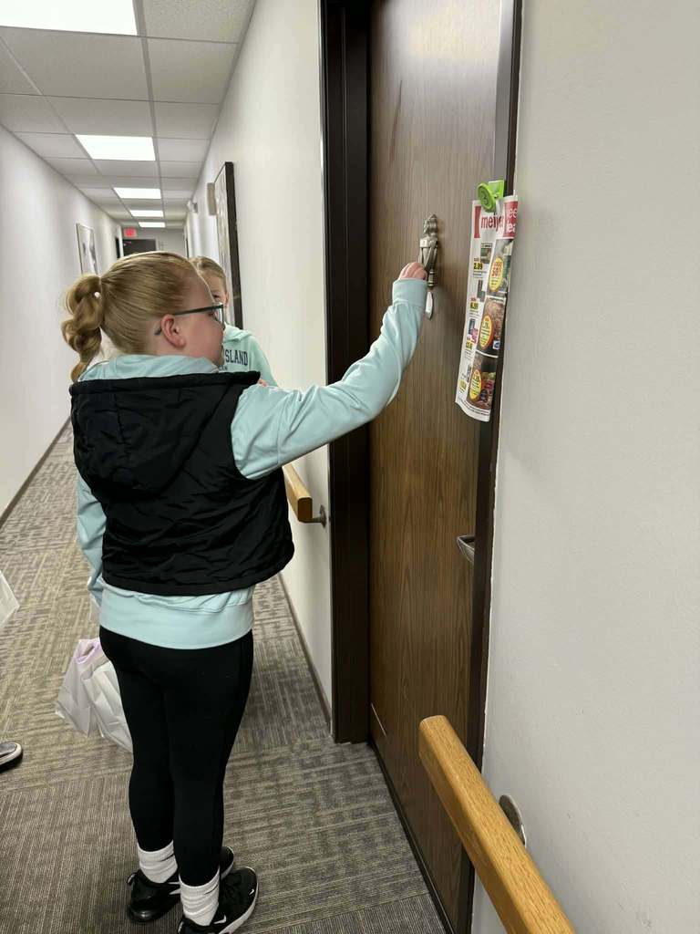 child knocking on a door