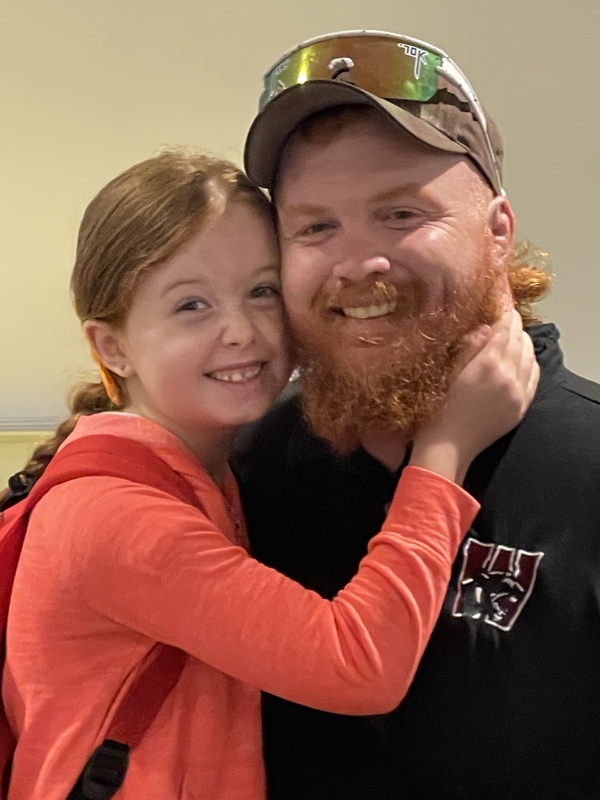 red haired little girl and red haired dad