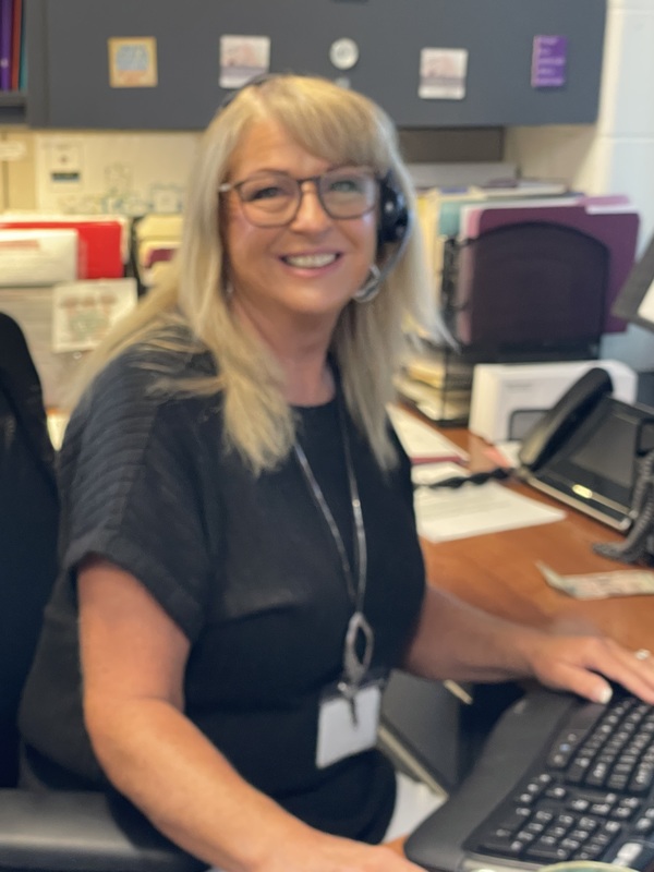HS Secretary working at her computer