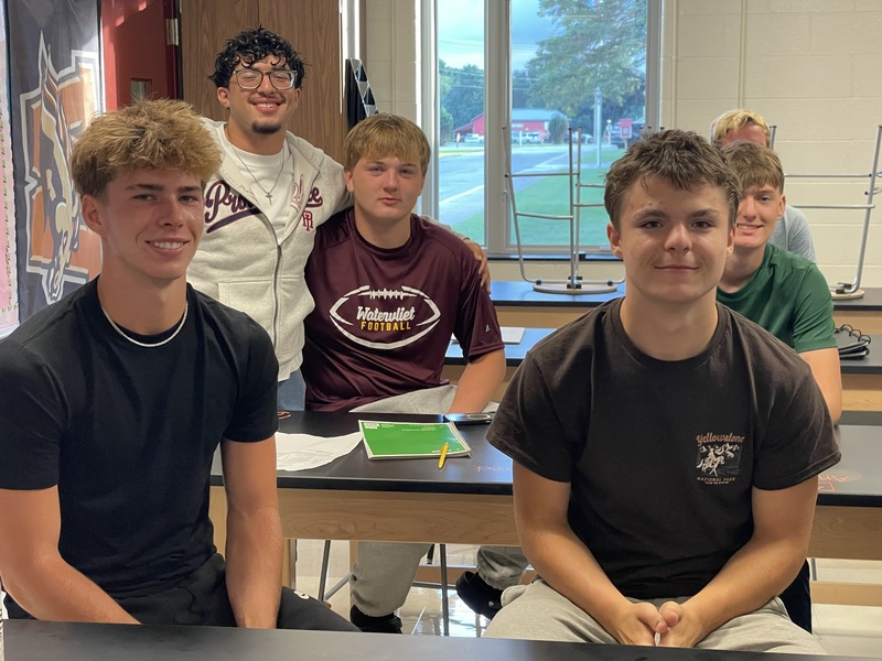 boys smiling in the science room