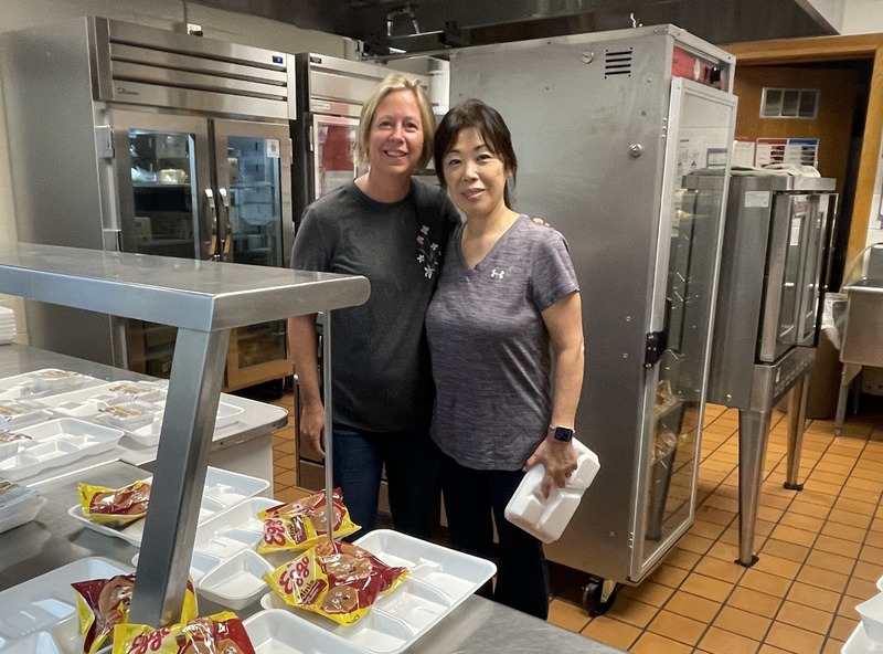 two cooks in the school kitchen