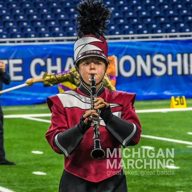 Band member playing instrument