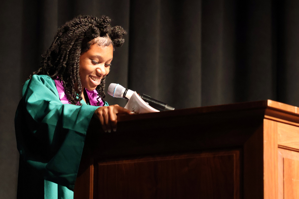 Student at podium. 