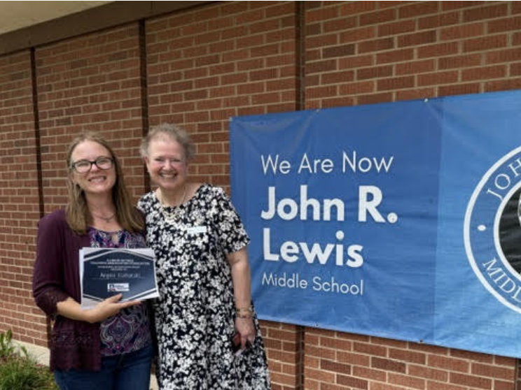 Ms. Kucharski receiving award from Illinois Retired Teachers Association