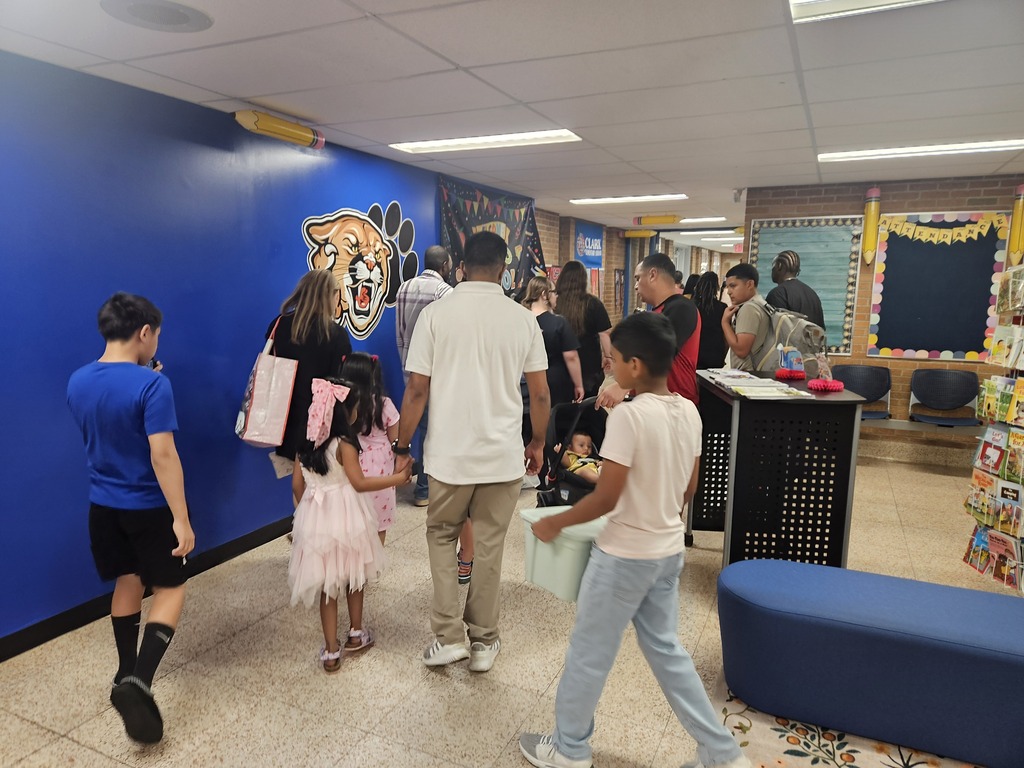 Meet and Greet: Families walk to classrooms.