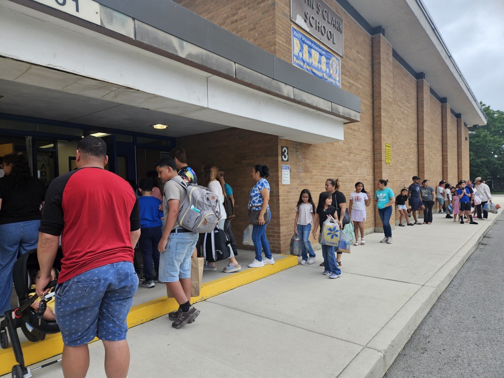 Meet and Greet: Families enter the school building.