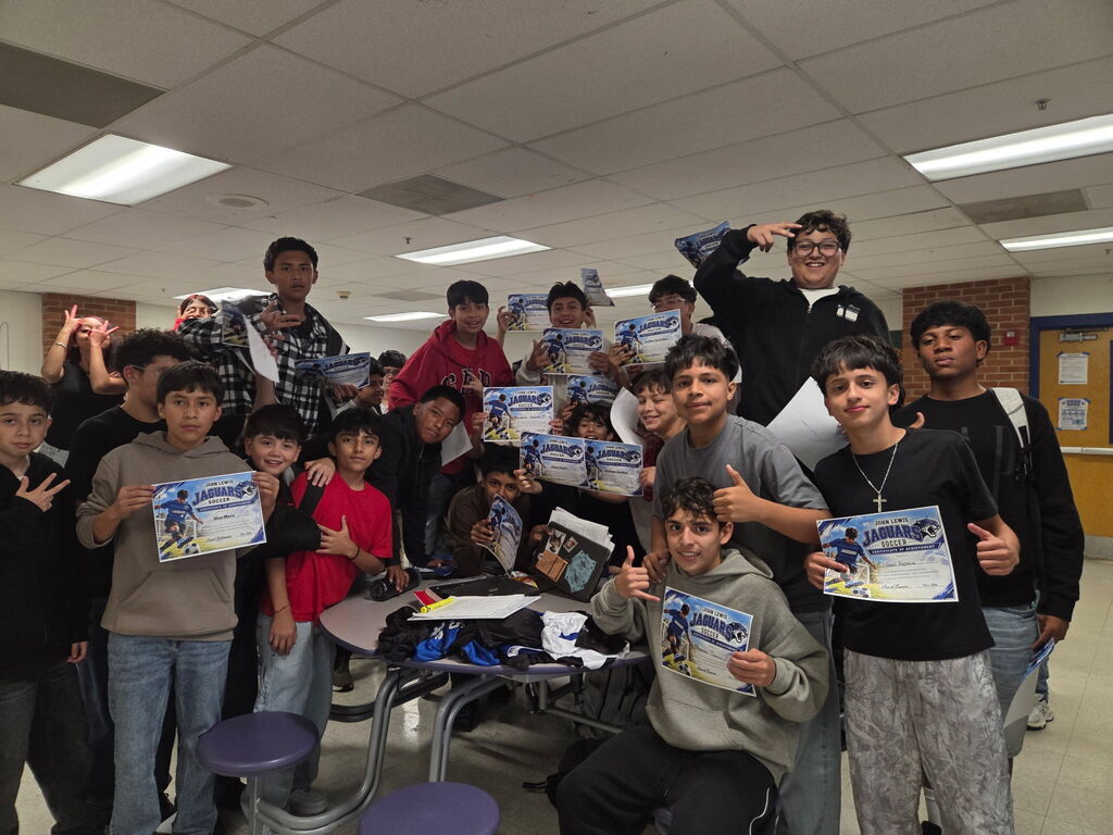 Boys Soccer team with certificates