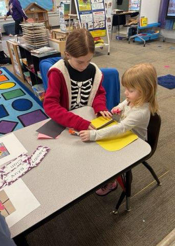 ❤️📚 Big Readers. Little Readers. BIG Impact. 📚❤️ Today our 5th graders stepped into an important role during Read Your Hearts Out — they became reading mentors for our preschoolers! There is something powerful about watching our oldest elementary students slow down, use expression, turn pages carefully, and share stories with our youngest Vikings. The smiles, the giggles, the pointing at pictures — it’s what school community is all about. Moments like these build: ✨ Confidence in our preschoolers ✨ Leadership in our 5th graders ✨ A culture where reading is valued at every age We are so proud of our 5th grade leaders for modeling patience, kindness, and a love for literacy. This is what Viking family looks like. ❤️ #WausaVikings #ReadYourHeartsOut #VikingLeaders #ReadersAreLeaders #BigKidsLittleKidsBigHearts