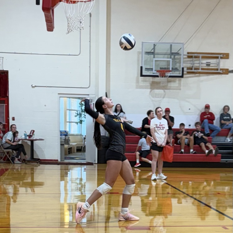 Reagan G with the serve 