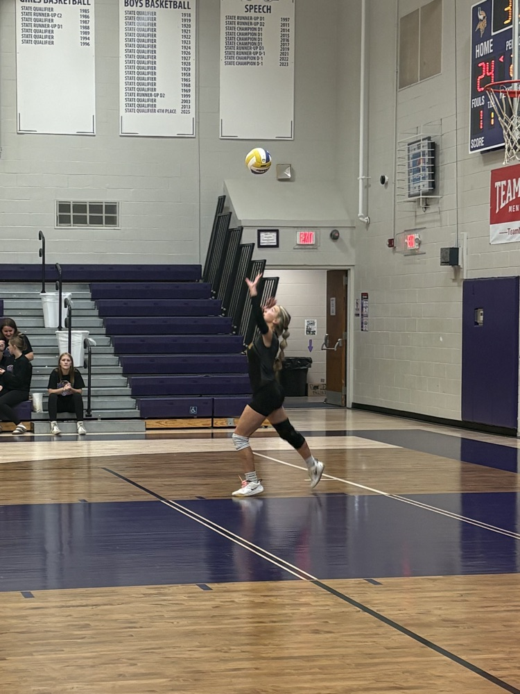 Kenley A on the serve