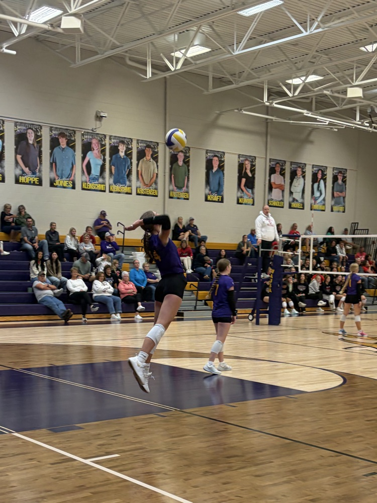 Hallie K on the serve