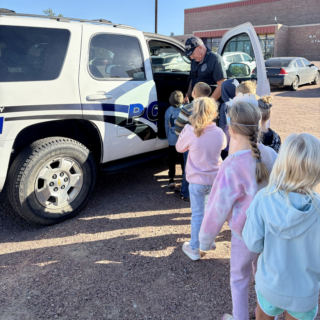 First grade class touring Officer Boston's police vehicle.