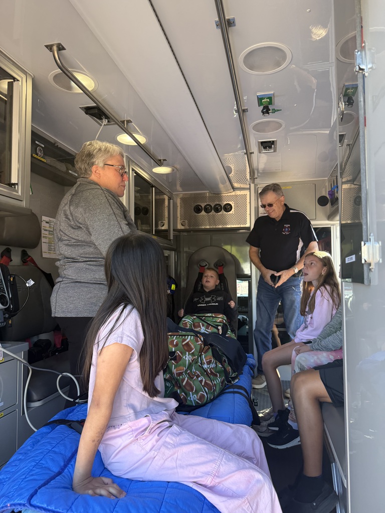 Fourth grade students get a demonstration of the ambulance.