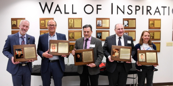 photo of 2026 wall of inspiration inductees with their plaques