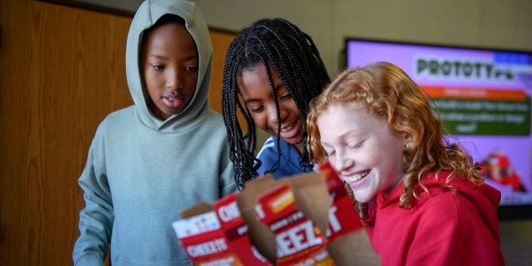 students working on a class project together