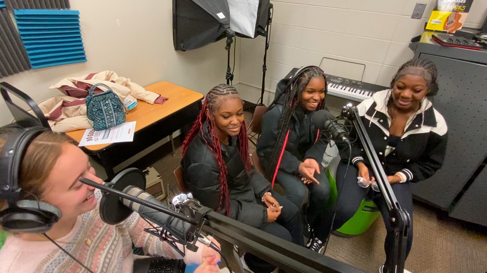 students recording a podcast