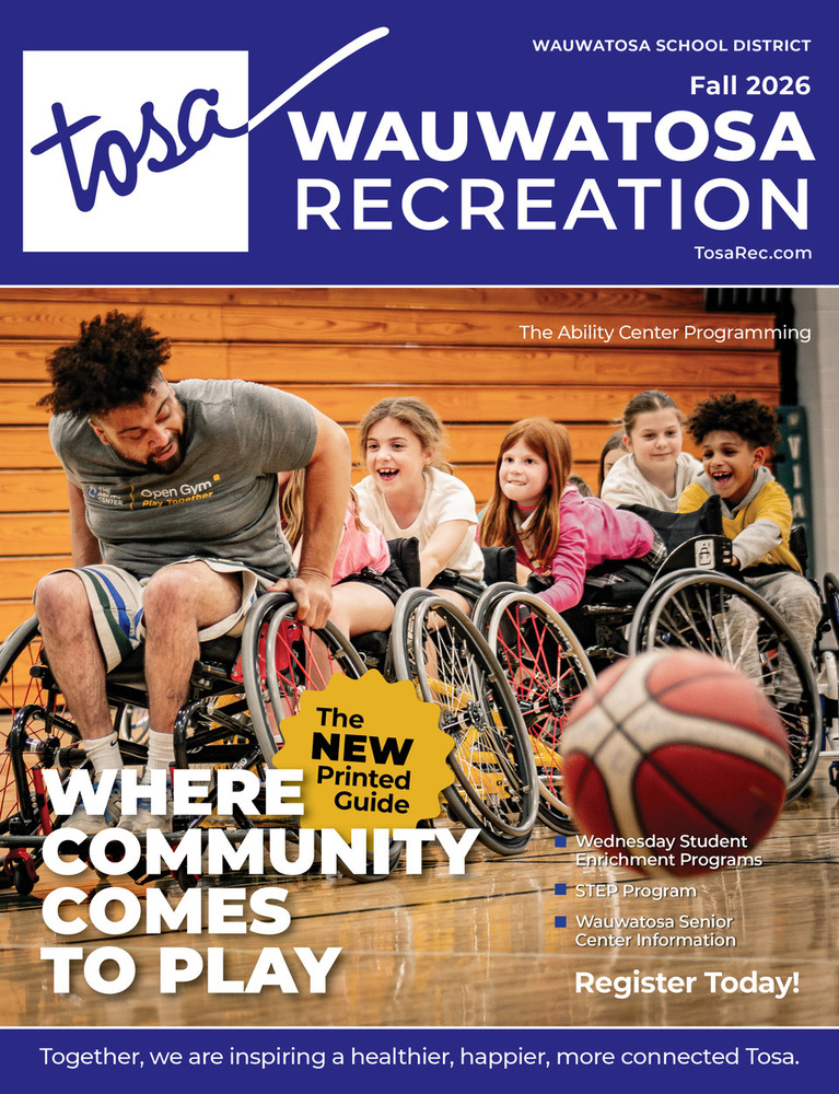 Ability Center leader leading kids in wheelchair basketball