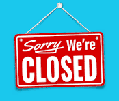 A red sign with white letters on a blue background reads "Sorry We're CLOSED." It hangs from a white string.