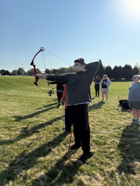 Students showing off thier archery skills