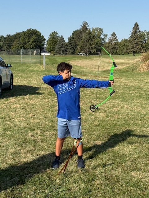 Students showing off thier archery skills