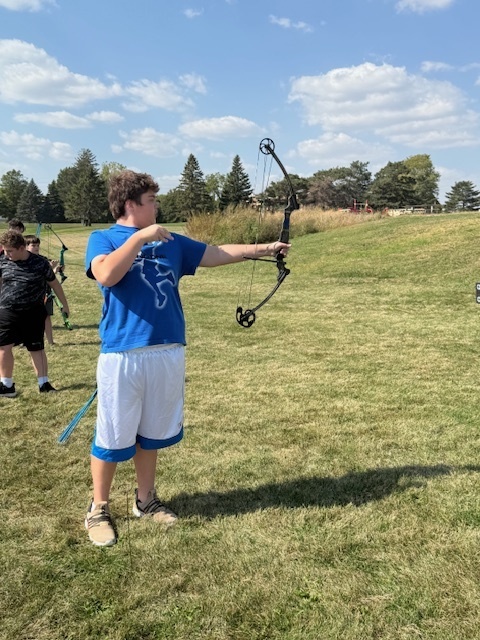 Students showing off thier archery skills