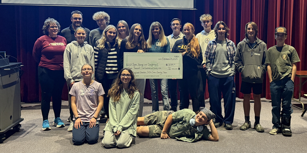 Cross county team donates to domestic abuse shelter