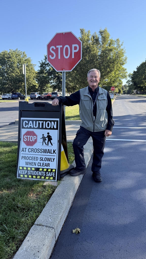 School Securtiy Officer Mr. Walther reminds Wayland campus visitors to stop at all front bus loop stop signs,