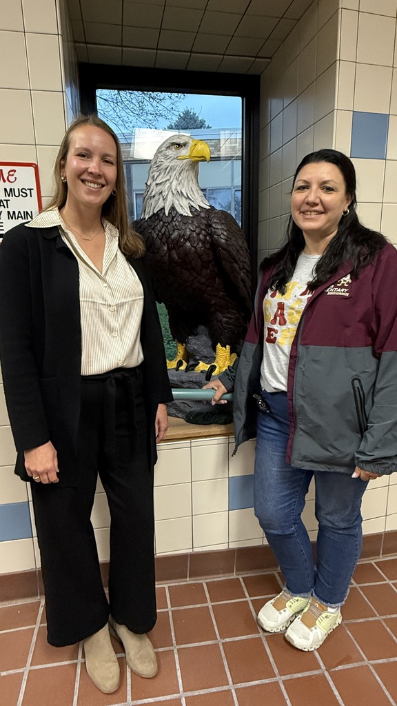 Director of Pupil Personnel and Services Katherine A. Wolcott, Psy.D. congratulates WCCS Elementary School Psychologist Amy Clark.