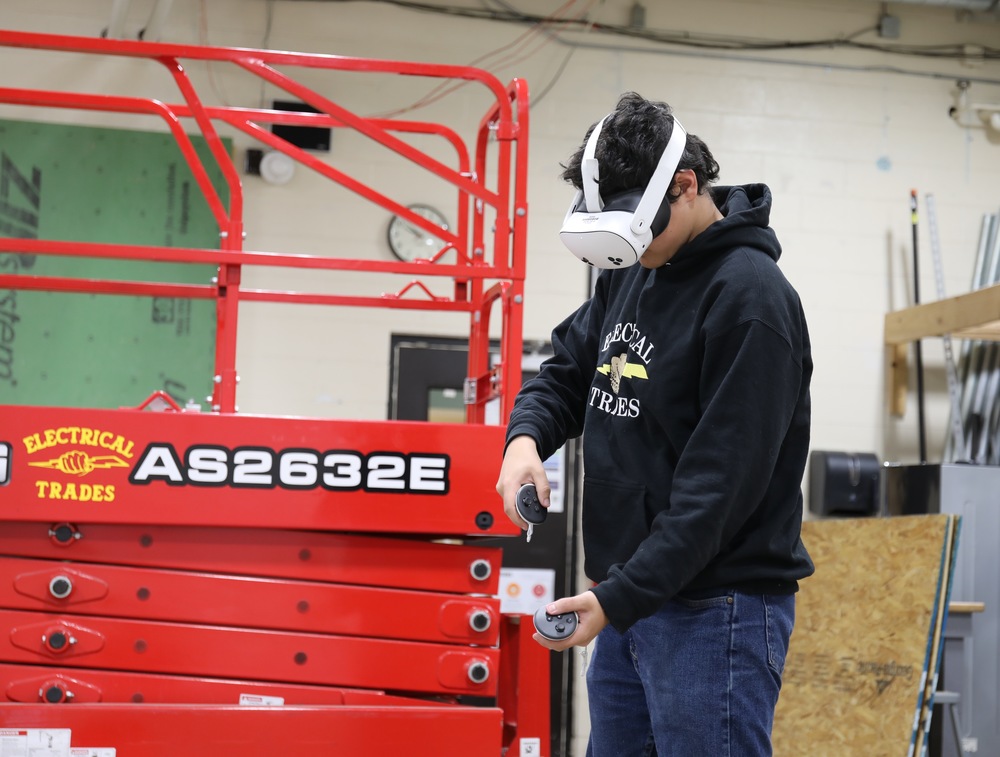 CTE Student uses a VR headset in the Electrical Trades Program