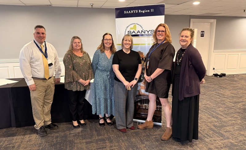 The FLSS Team celebrates with Alison Cantu