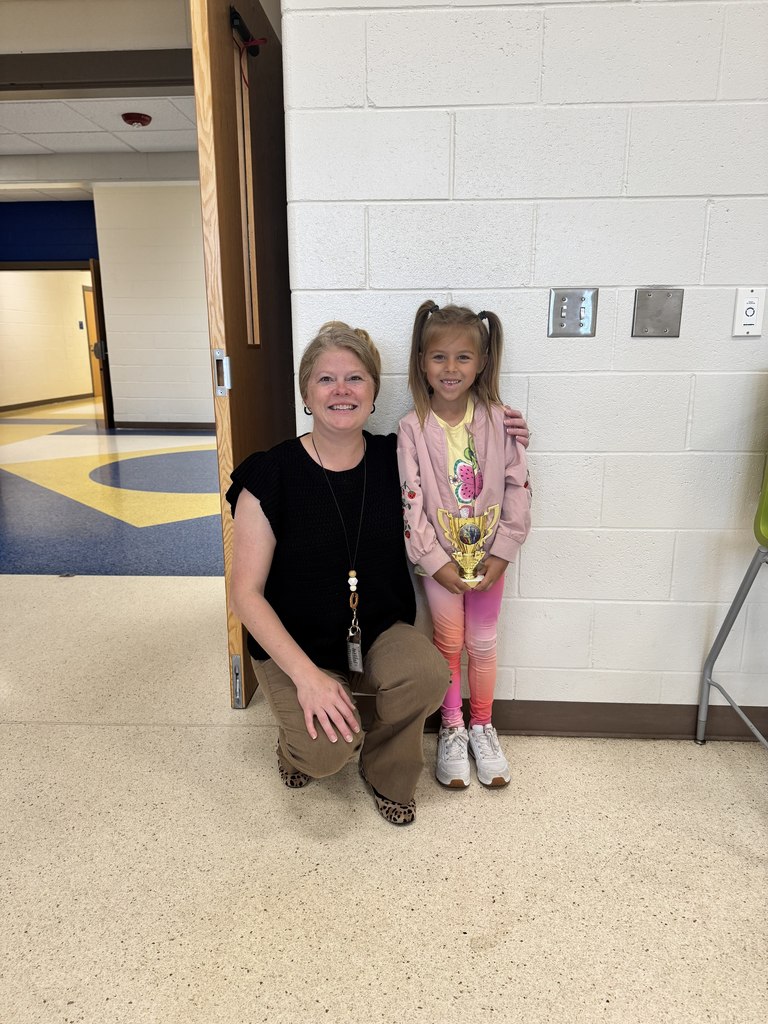 mrs ingram art teacher with a student