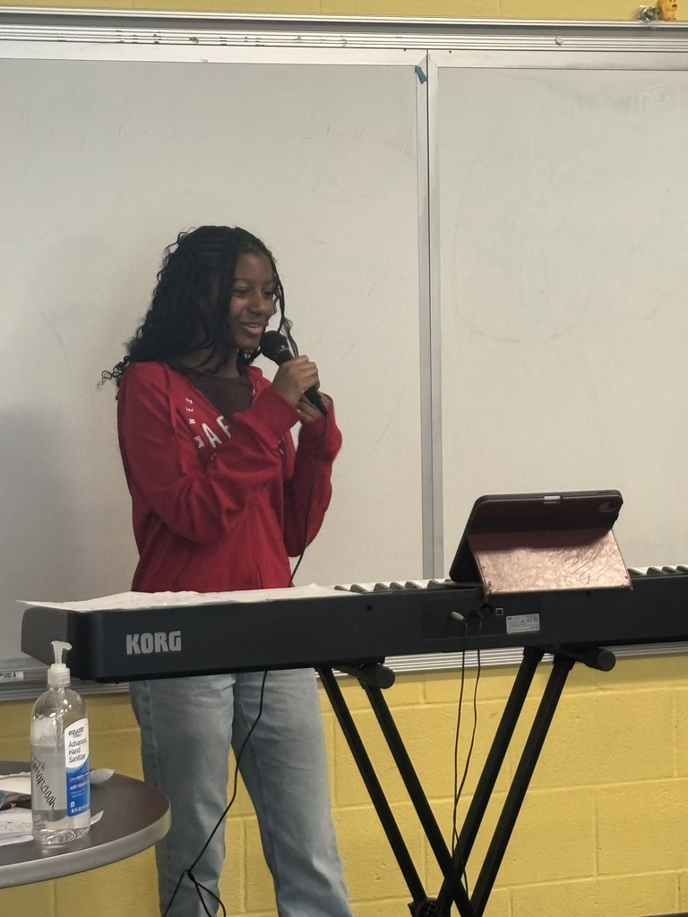SCM choir students performing for their peers.