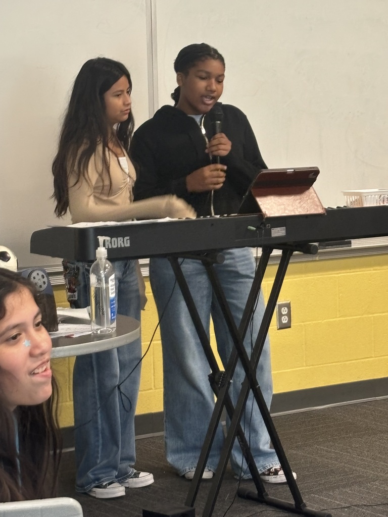 SCM choir students performing for their peers.