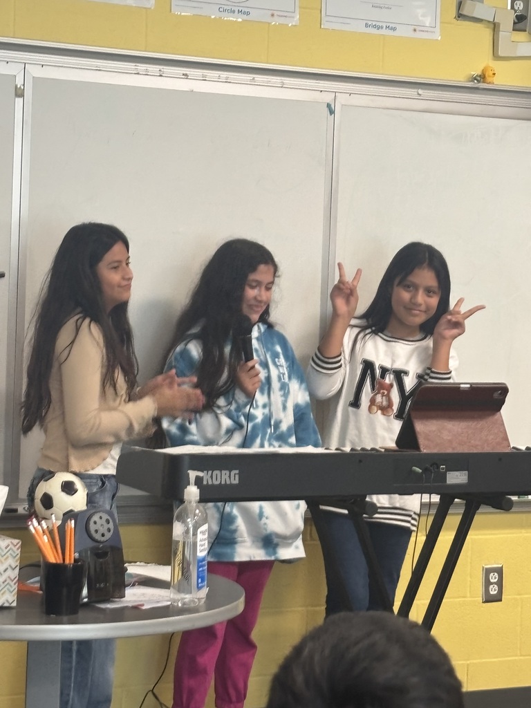 SCM choir students performing for their peers.
