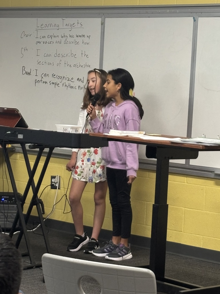 SCM choir students performing for their peers.
