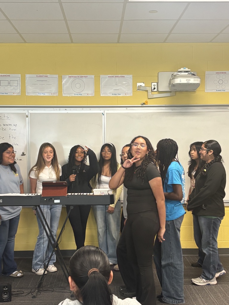 SCM choir students performing for their peers.
