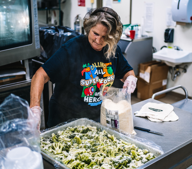 WCS Cook Preparing Meal for Summer Exploration Camp at CK Elementary.
