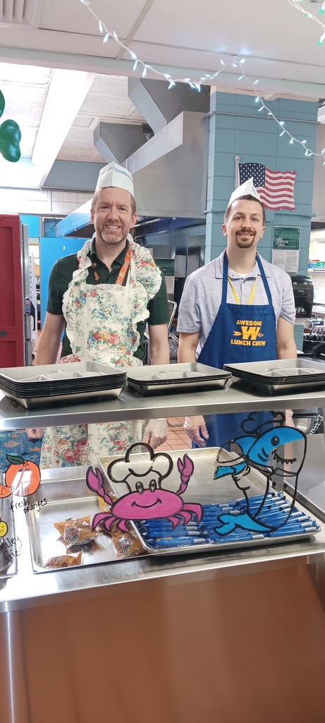 Summitview teachers serving breakfast at Summitview Elementary