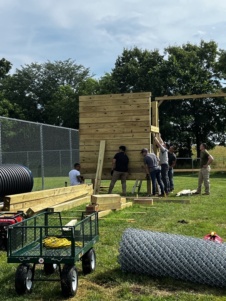 Volunteers working on the JROTC obstacle course