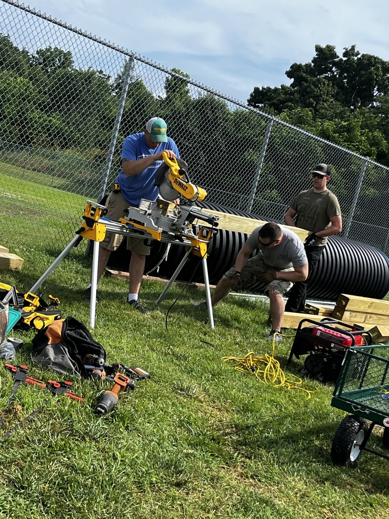 Volunteers working on the JROTC obstacle course