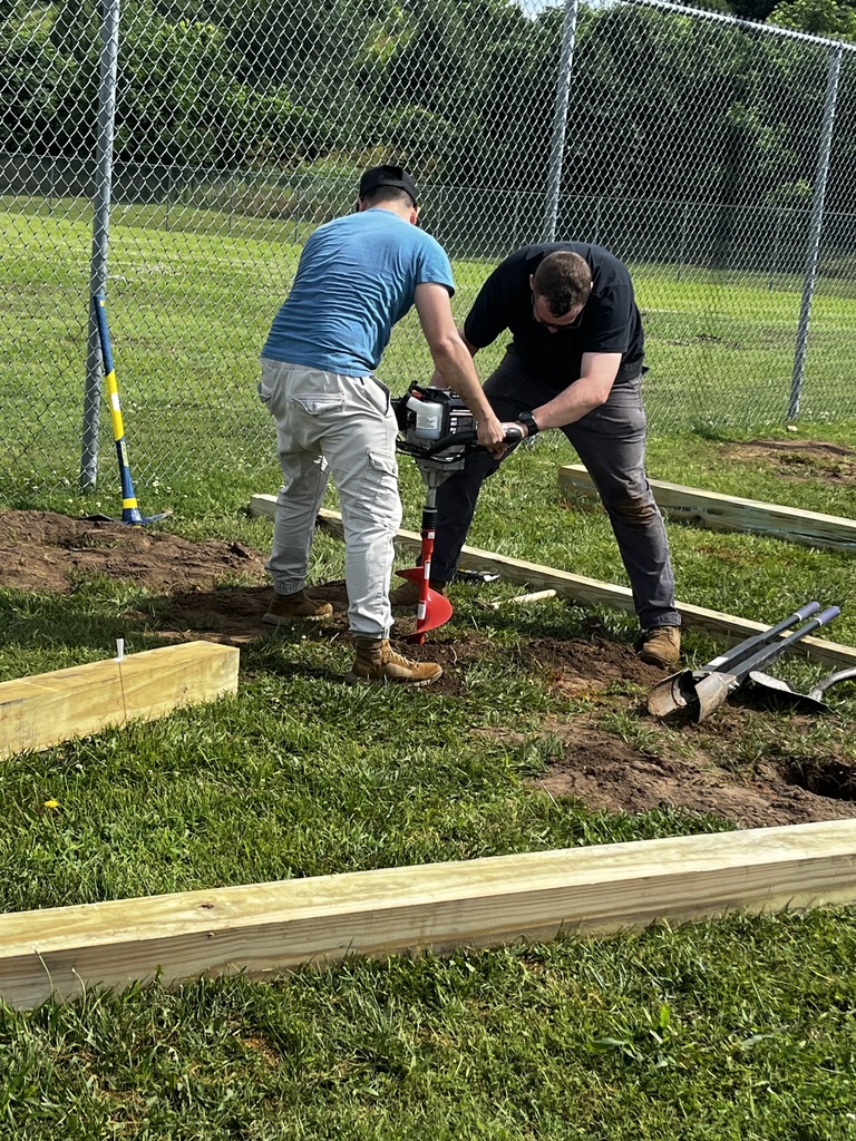 Volunteers working on the JROTC obstacle course