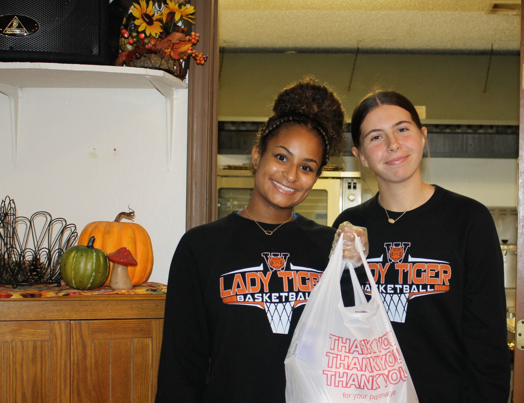 Waynesville High School students assisted with the Thanksgiving meal at the Waynesville-St. Robert Senior Citizens Center. Students from both HOSA (future health professionals) and the varsity girls basketball team and their sponsors/coaches helped make the day special. In addition, the basketball players and coaches selected angels from the tree to sponsor for the holidays and later purchased them gifts.