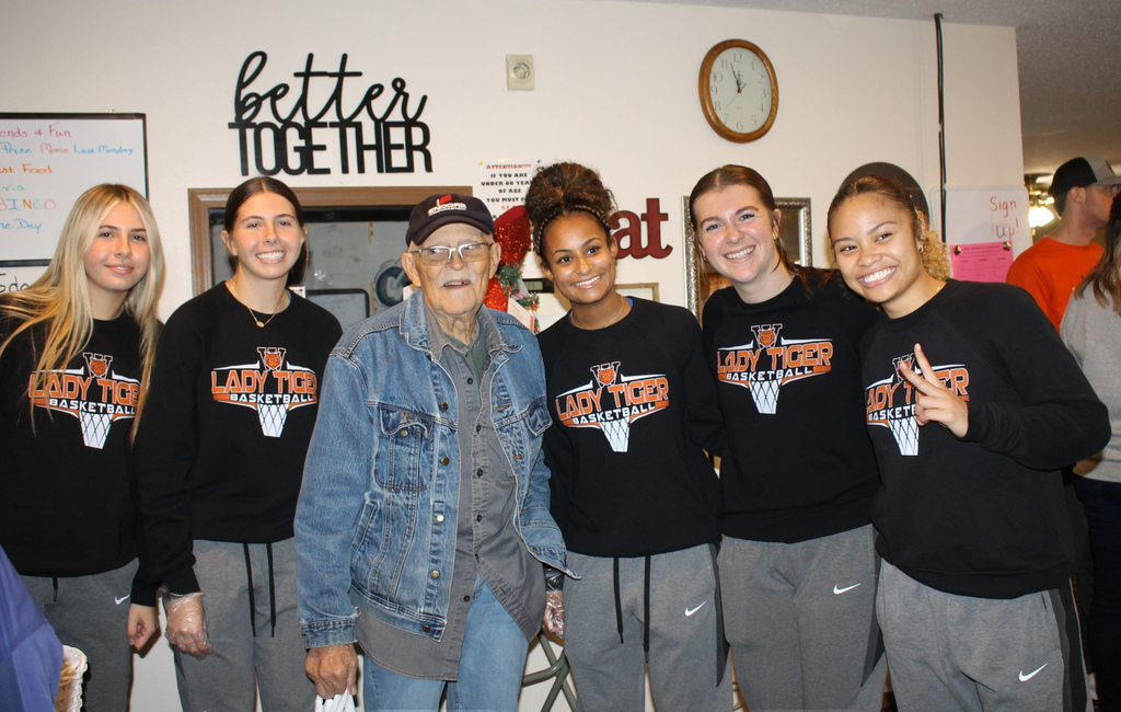 Waynesville High School students assisted with the Thanksgiving meal at the Waynesville-St. Robert Senior Citizens Center. Students from both HOSA (future health professionals) and the varsity girls basketball team and their sponsors/coaches helped make the day special. In addition, the basketball players and coaches selected angels from the tree to sponsor for the holidays and later purchased them gifts.