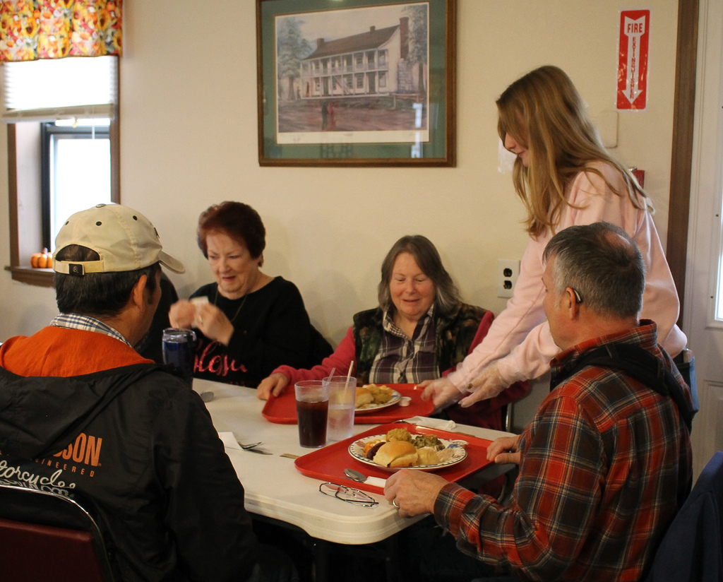Waynesville High School students assisted with the Thanksgiving meal at the Waynesville-St. Robert Senior Citizens Center. Students from both HOSA (future health professionals) and the varsity girls basketball team and their sponsors/coaches helped make the day special. In addition, the basketball players and coaches selected angels from the tree to sponsor for the holidays and later purchased them gifts.